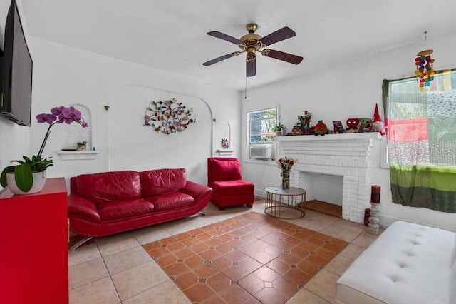 536 Ave G SE, Winter Haven, FL 33880 - tiled living room featuring ceiling fan, a fireplace, and cooling unit
