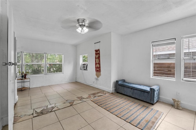 536 Ave G SE, Winter Haven, FL 33880 - spare room featuring a ceiling fan, tile patterned flooring, and cooling unit