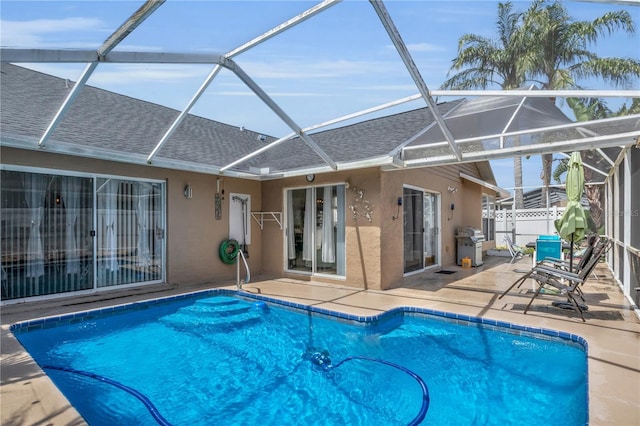332 Wood Dove Ave, Tarpon Springs, FL 34689 - view of pool with a patio area, a grill, fence, and a lanai