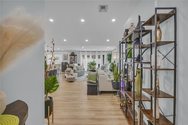 332 Wood Dove Ave, Tarpon Springs, FL 34689 - living room with wood finished floors and recessed lighting