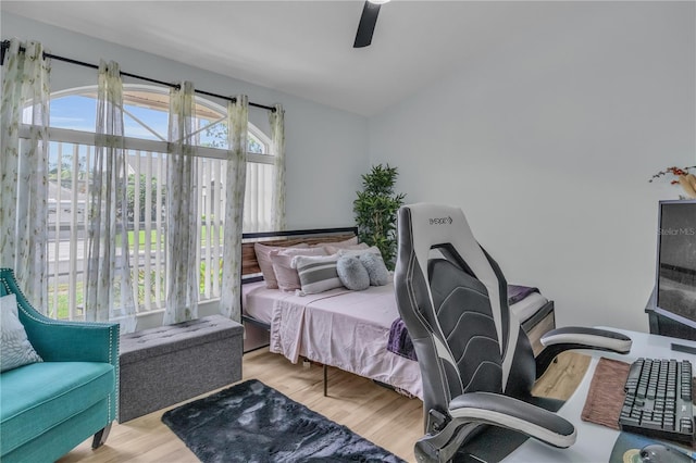 332 Wood Dove Ave, Tarpon Springs, FL 34689 - bedroom featuring wood finished floors, ceiling fan, and vaulted ceiling