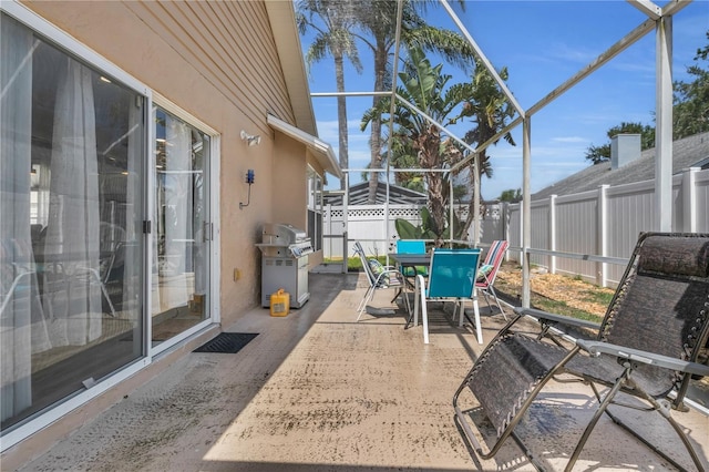 332 Wood Dove Ave, Tarpon Springs, FL 34689 - sunroom / solarium featuring outdoor dining space