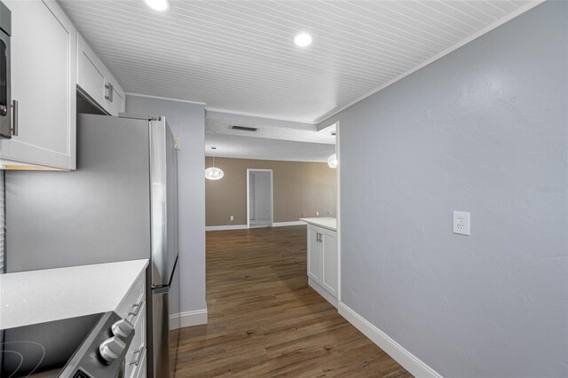 10216 Regal Dr Unit 208, Largo, FL 33774 - corridor with dark wood finished floors, baseboards, and recessed lighting