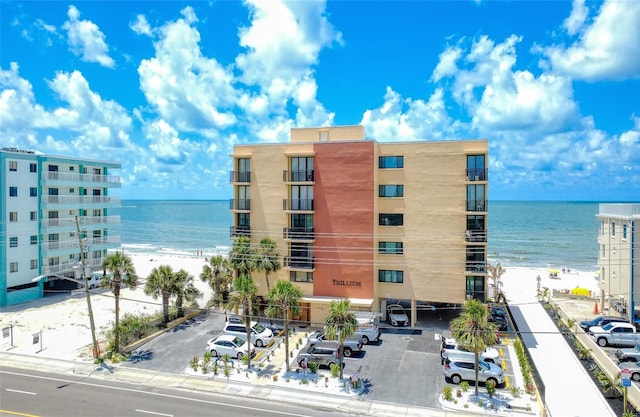 14146 Gulf Blvd Unit 4B, Madeira Beach, FL 33708 - view of building exterior with view of water and beach
