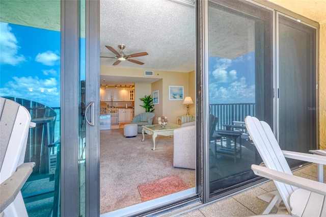 14146 Gulf Blvd Unit 4B, Madeira Beach, FL 33708 - balcony featuring a ceiling fan