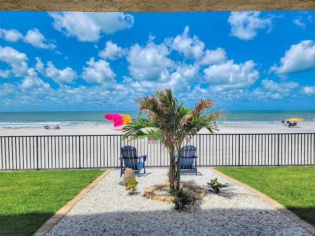 14146 Gulf Blvd Unit 4B, Madeira Beach, FL 33708 - view of yard featuring a patio area and view of water and beach