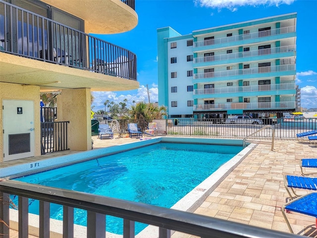 14146 Gulf Blvd Unit 4B, Madeira Beach, FL 33708 - community pool with a patio area and fence