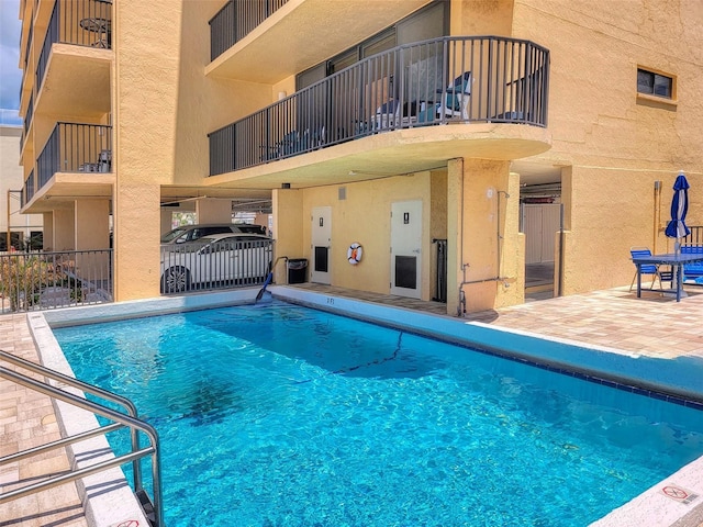 14146 Gulf Blvd Unit 4B, Madeira Beach, FL 33708 - community pool with a patio area and fence