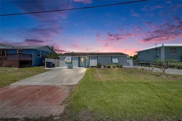 825 Seabreeze Dr, Ruskin, FL 33570 - ranch-style house featuring concrete driveway and stucco siding