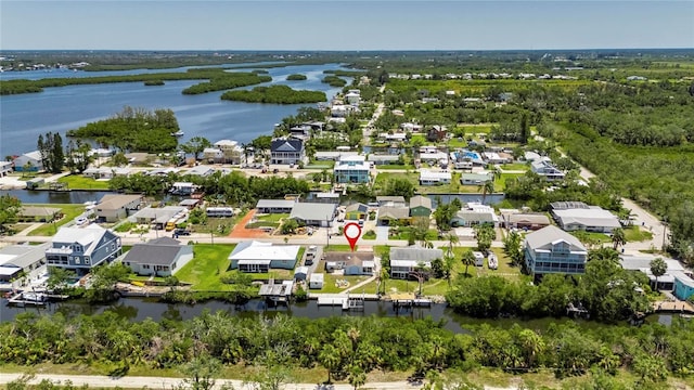 825 Seabreeze Dr, Ruskin, FL 33570 - aerial perspective of suburban area with a nearby body of water