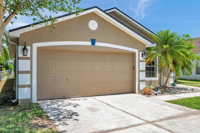 8504 Tidal Bay Ln, Tampa, FL 33635 - garage featuring driveway