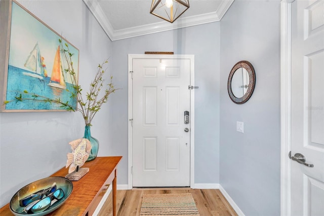 8504 Tidal Bay Ln, Tampa, FL 33635 - entrance foyer featuring ornamental molding, light wood-style flooring, and baseboards