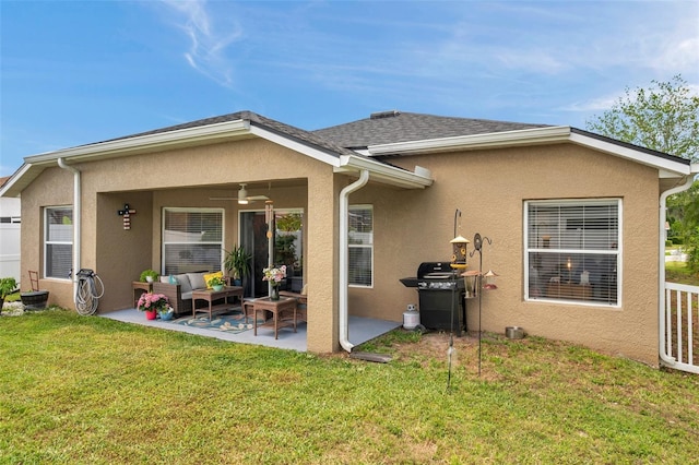 8504 Tidal Bay Ln, Tampa, FL 33635 - back of property with stucco siding, an outdoor hangout area, a ceiling fan, and a patio area