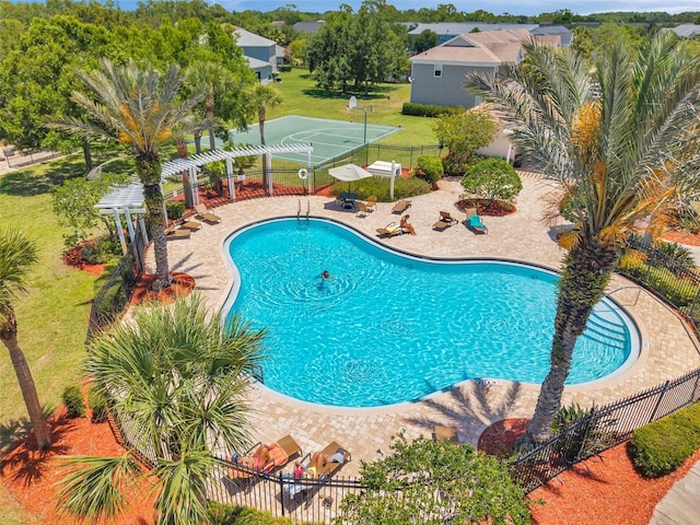 8504 Tidal Bay Ln, Tampa, FL 33635 - community pool with a patio area