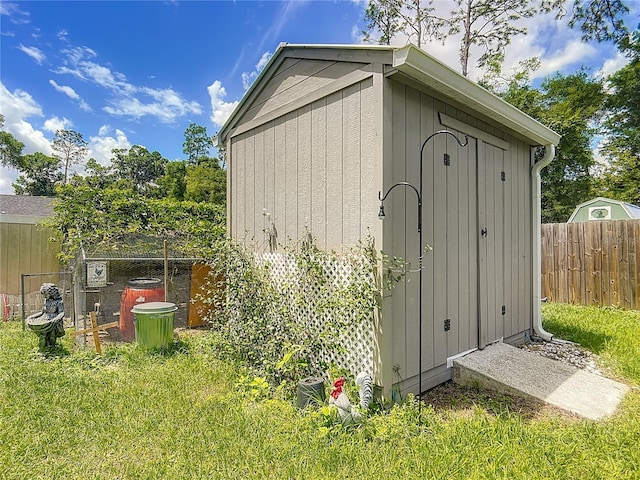 view of shed featuring a fenced backyard