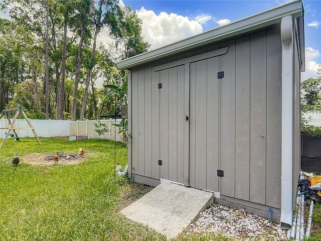 view of shed featuring a playground
