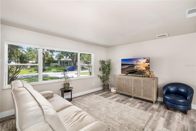 1530 Picardy Cir, Clearwater, FL 33755 - living area with wood finished floors and baseboards