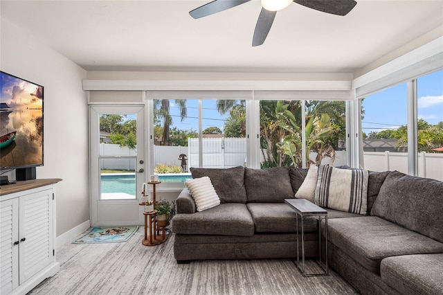 1530 Picardy Cir, Clearwater, FL 33755 - sunroom with wood finished floors and a wooden deck