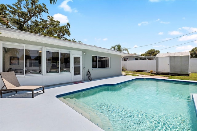 1530 Picardy Cir, Clearwater, FL 33755 - view of pool with a patio area and a storage unit