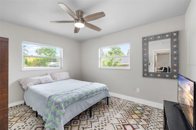1530 Picardy Cir, Clearwater, FL 33755 - bedroom featuring multiple windows and a ceiling fan