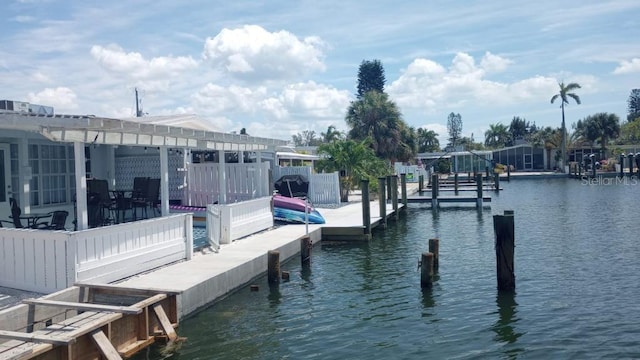 28 Seaside Ct, Holmes Beach, FL 34217 - dock featuring a water view