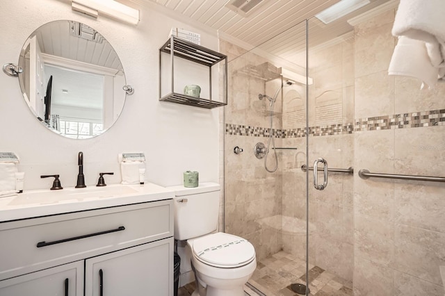 28 Seaside Ct, Holmes Beach, FL 34217 - full bath with a shower stall, toilet, and vanity