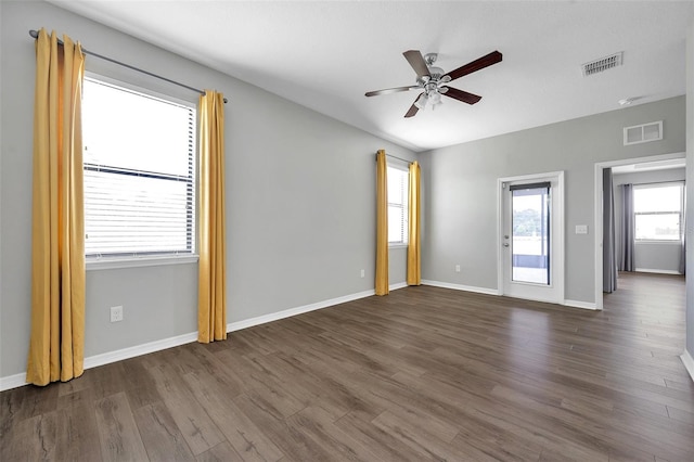 11878 Thicket Wood Dr, Riverview, FL 33579 - spare room with ceiling fan, dark wood-type flooring, and baseboards