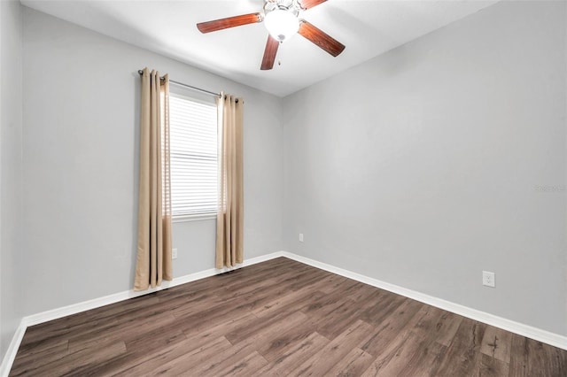 11878 Thicket Wood Dr, Riverview, FL 33579 - empty room with dark wood-style flooring, ceiling fan, and baseboards