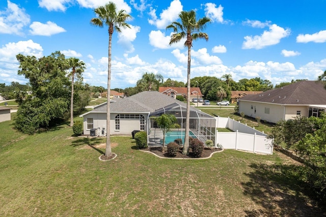 6129 Schalekamp Dr, Spring Hill, FL 34609 - back of property with a lanai and an outdoor pool