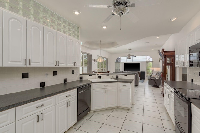 6129 Schalekamp Dr, Spring Hill, FL 34609 - kitchen with ceiling fan, black appliances, dark countertops, and recessed lighting