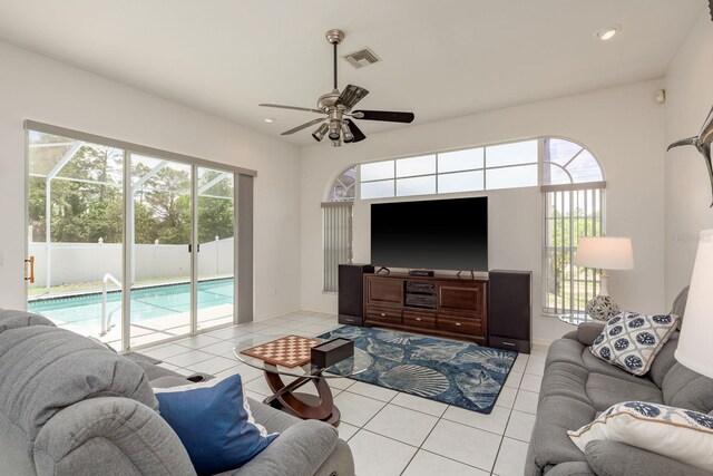 6129 Schalekamp Dr, Spring Hill, FL 34609 - tiled living area featuring plenty of natural light, ceiling fan, and recessed lighting