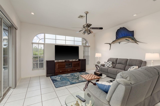 6129 Schalekamp Dr, Spring Hill, FL 34609 - living area featuring light tile patterned floors, ceiling fan, recessed lighting, and baseboards