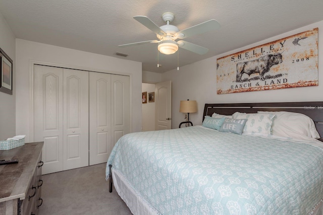 6129 Schalekamp Dr, Spring Hill, FL 34609 - bedroom featuring light carpet, a closet, and a ceiling fan
