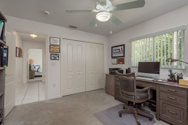 6129 Schalekamp Dr, Spring Hill, FL 34609 - office area with a ceiling fan, light carpet, and light tile patterned floors