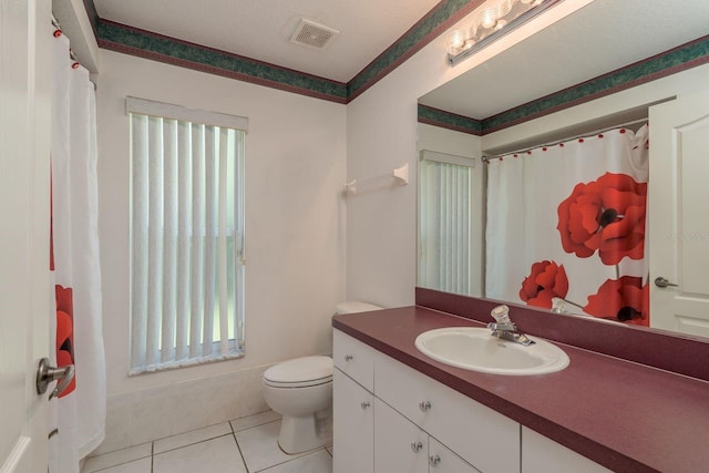 6129 Schalekamp Dr, Spring Hill, FL 34609 - bathroom with toilet, tile patterned floors, and vanity