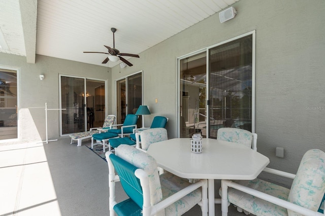 6129 Schalekamp Dr, Spring Hill, FL 34609 - view of patio / terrace with ceiling fan and outdoor dining area
