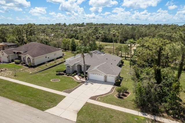 6129 Schalekamp Dr, Spring Hill, FL 34609 - aerial view of property and surrounding area featuring a heavily wooded area