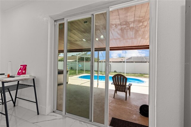 3104 Apricot St, Seffner, FL 33584 - doorway to outside featuring plenty of natural light and baseboards