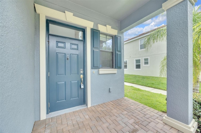 1028 Oliveto Verdi Ct, Brandon, FL 33511 - property entrance featuring stucco siding