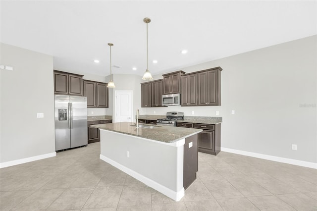1028 Oliveto Verdi Ct, Brandon, FL 33511 - kitchen with stainless steel appliances, a sink, dark brown cabinetry, light tile patterned floors, and recessed lighting