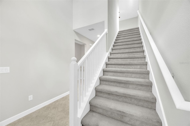 1028 Oliveto Verdi Ct, Brandon, FL 33511 - stairs featuring baseboards and tile patterned flooring