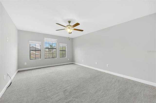 1028 Oliveto Verdi Ct, Brandon, FL 33511 - empty room featuring a ceiling fan, baseboards, and carpet floors