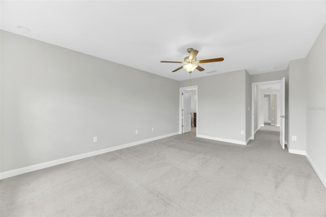 1028 Oliveto Verdi Ct, Brandon, FL 33511 - unfurnished bedroom with baseboards, light colored carpet, and a ceiling fan
