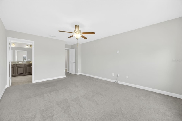 1028 Oliveto Verdi Ct, Brandon, FL 33511 - unfurnished bedroom featuring baseboards and carpet floors