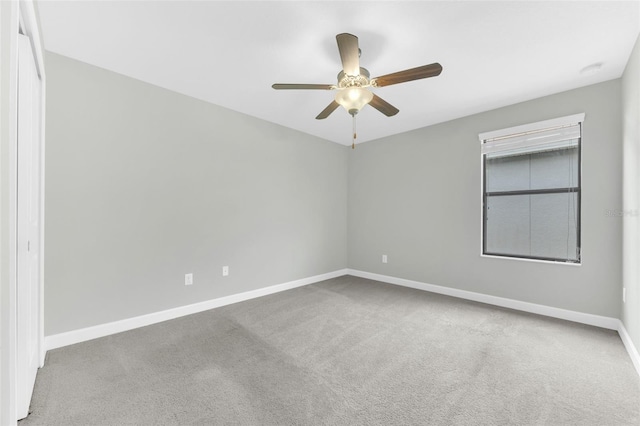 1028 Oliveto Verdi Ct, Brandon, FL 33511 - unfurnished room featuring carpet, ceiling fan, and baseboards