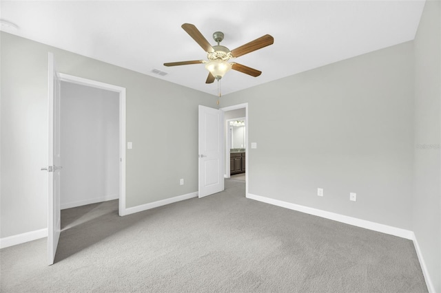 1028 Oliveto Verdi Ct, Brandon, FL 33511 - unfurnished bedroom with baseboards, carpet floors, and ceiling fan
