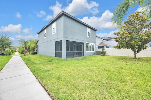 1028 Oliveto Verdi Ct, Brandon, FL 33511 - back of house featuring a sunroom, stucco siding, and cooling unit