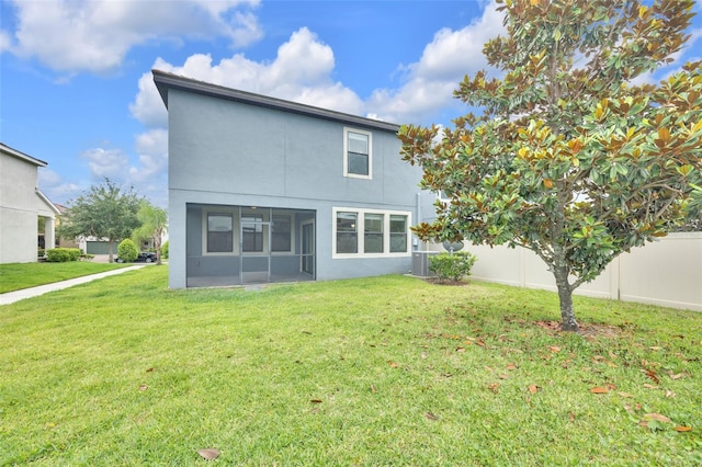1028 Oliveto Verdi Ct, Brandon, FL 33511 - rear view of house featuring stucco siding and a sunroom