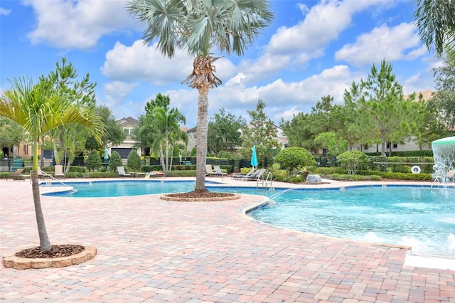 1028 Oliveto Verdi Ct, Brandon, FL 33511 - community pool with a patio area and fence