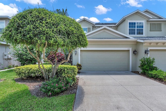 4717 Osprey Ridge Cir, Palm Harbor, FL 34684 - view of front facade featuring stucco siding and concrete driveway